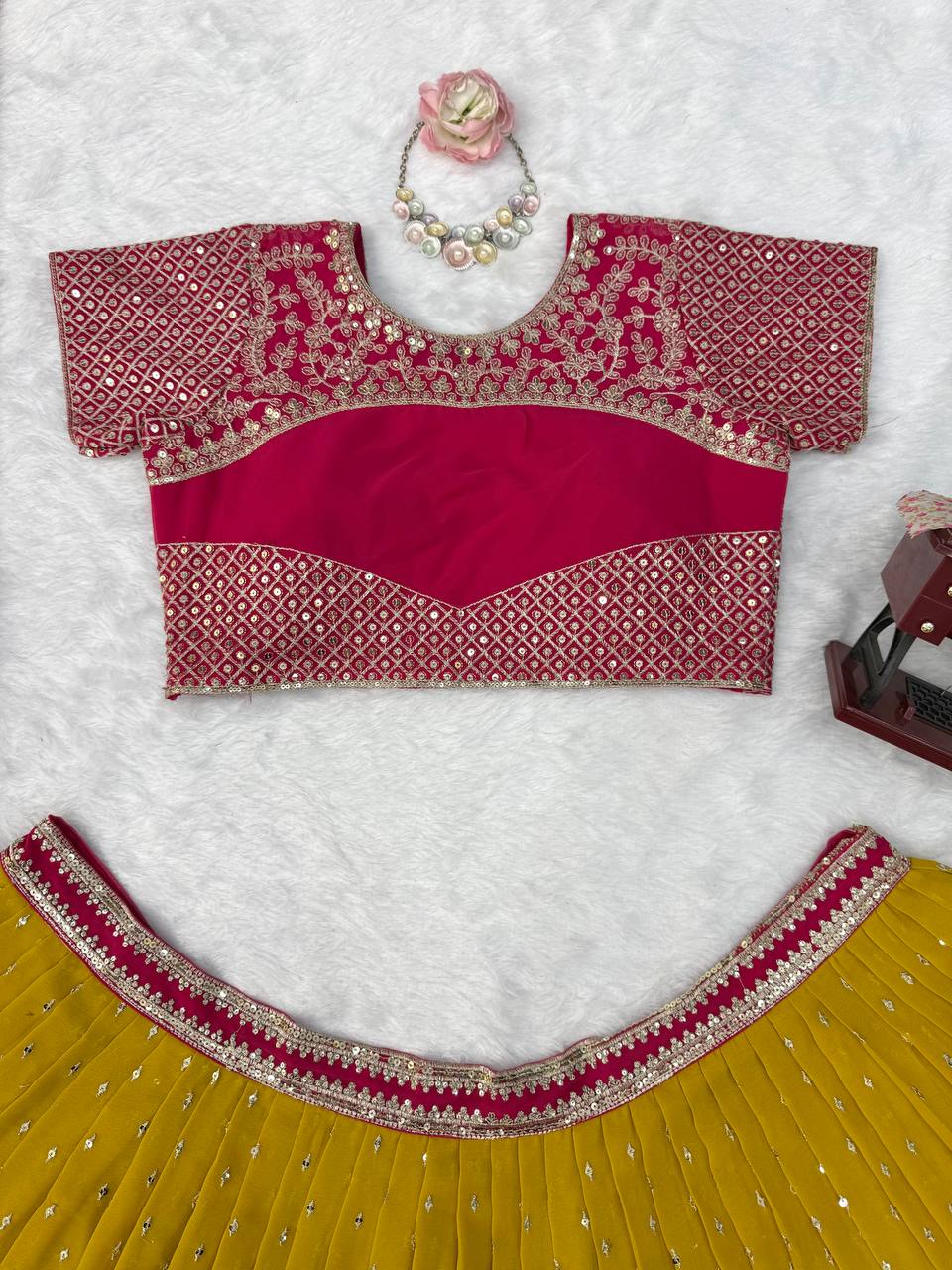 Vibrant Sunshine Yellow and Fuchsia Pink Designer Lehenga Choli with Dazzling Shimmer Embellishments